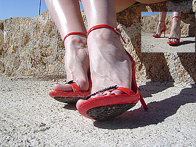 Relaxing In Red Sandals High Heels Sitting In The Sun